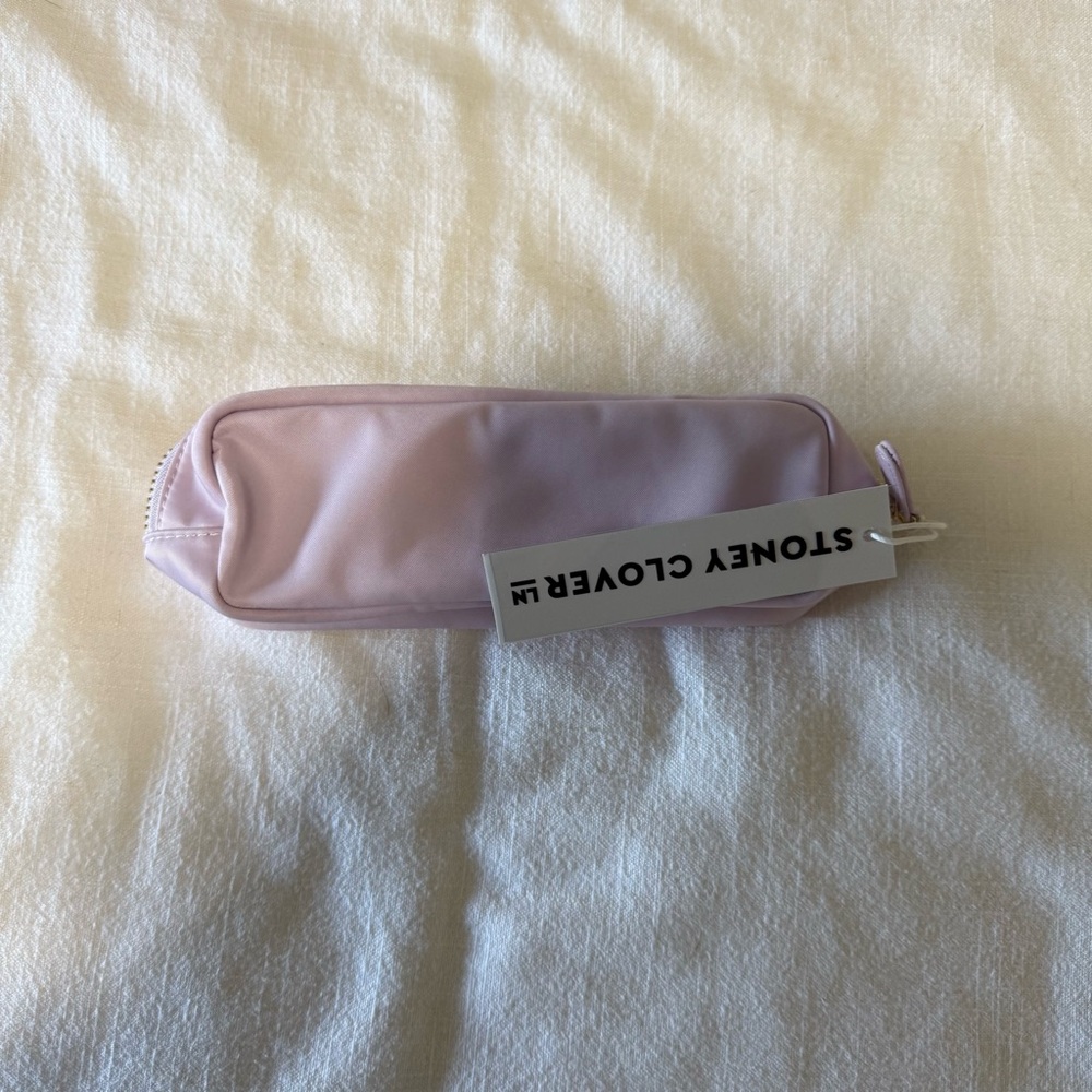 Stoney Clover Lane NWT Lilac Slim Pouch
